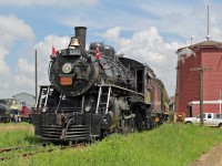 The museum's resident steam workhorse, CN 1392 is seen passing the 1919 Gibbons Water Tower. The locomotive is a 4-6-0 built by MLW in 1913 for CNoR and later absorbed into CN.