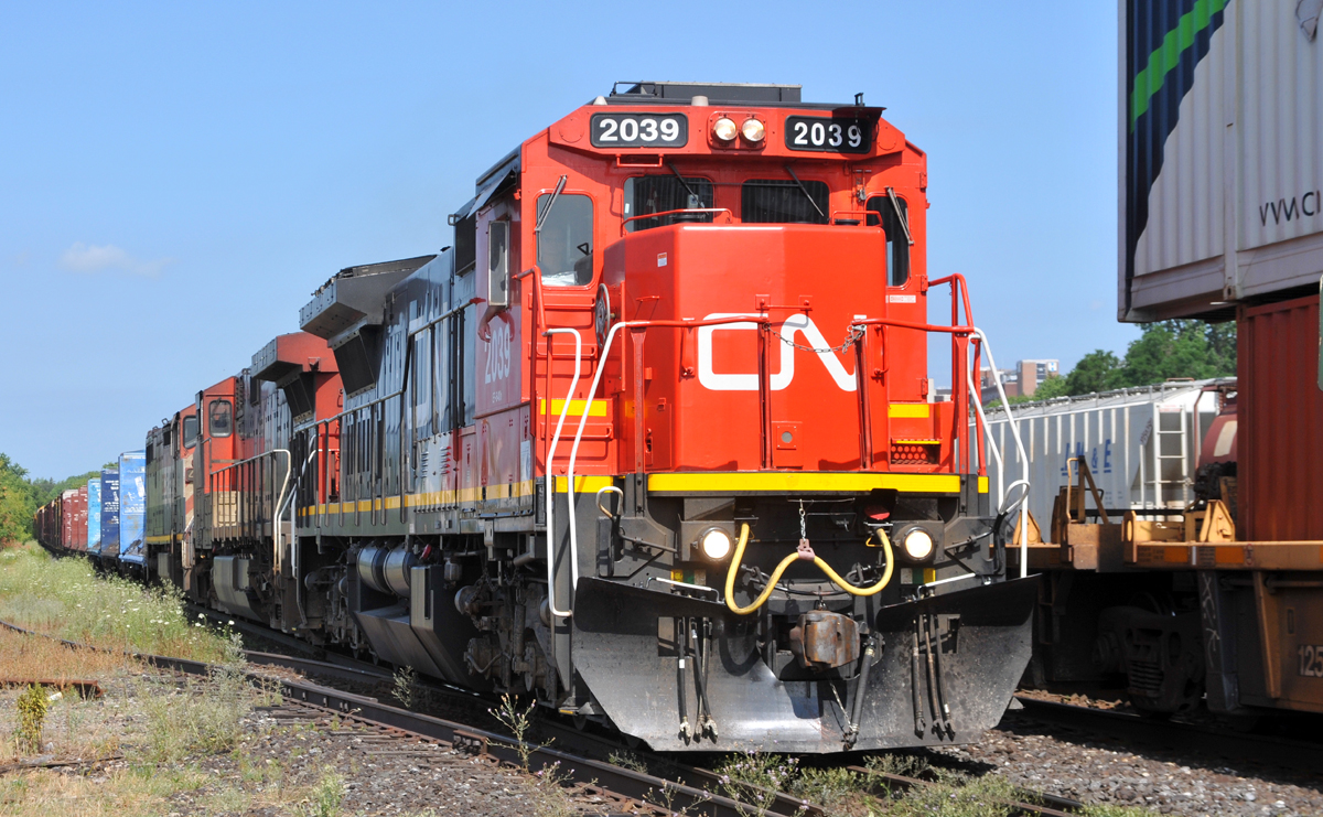394 heads through Brantford with CN 2039 - CN 2660 - BCOL 4619 and 167 cars. This was definitely one of the best consists that I've seen on CN in the last few months