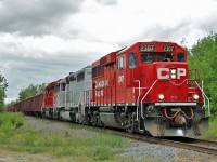 CP 2307, CEFX 3109 and CP 2263 team up to drag CP GPS-08 southwards down the MacTier Sub through Utopia, under threatening skies.  Not quite the lashup that was roaming around last week with a pair of CEFX SD40-2's, however a pair of rebuilt geeps bracketing a veteran SD40 was a nice sight!  CP GPS-08 originated at Sudbury and is made up of 40 Herzog Ballast Loads for the Belleville Sub and was filled out with 37 mixed freight.  Shortly after rolling through Utopia, this train would stop to work at Spence.