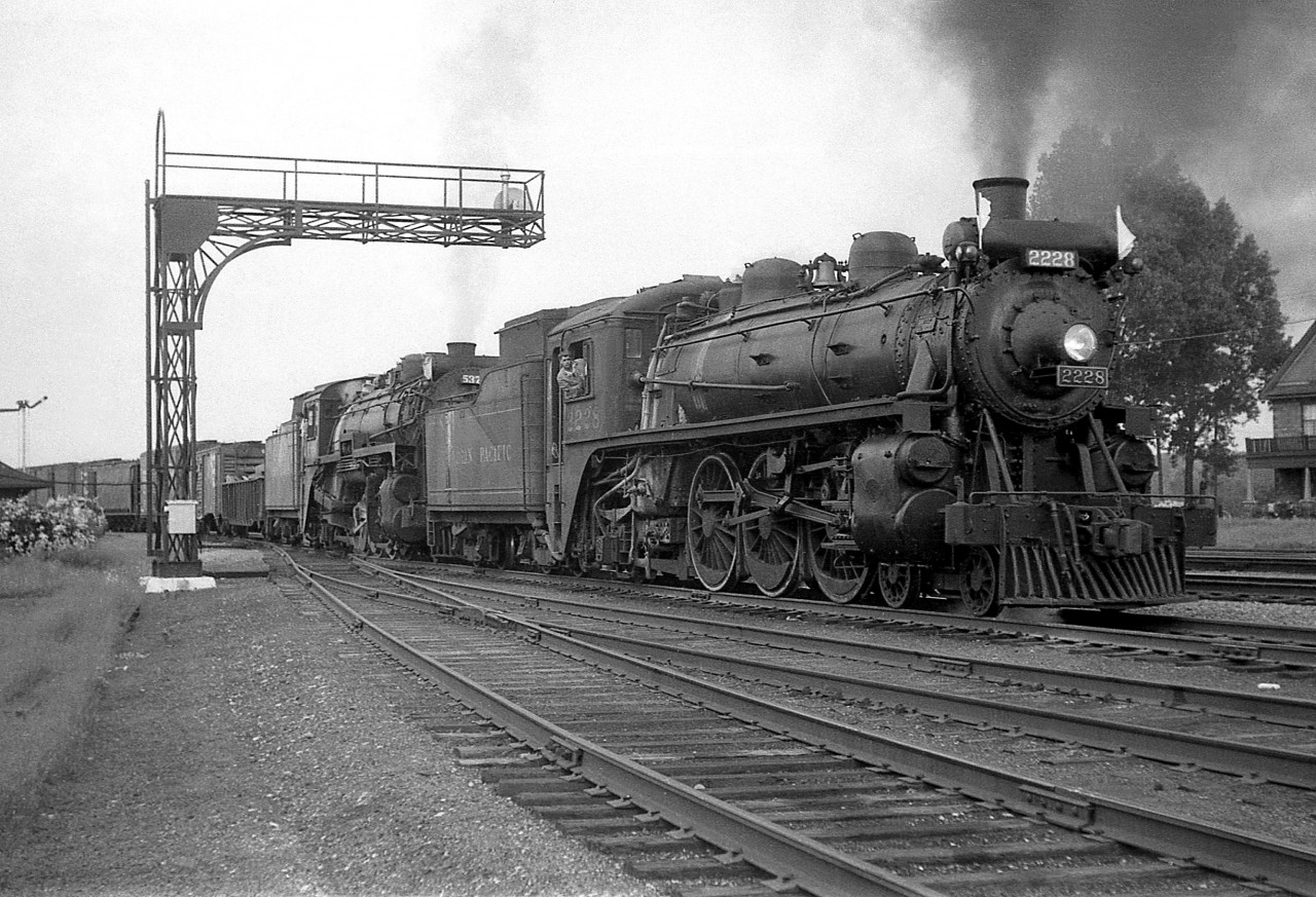 A personal favourite: Steam was still common on the CPR's Galt Sub in August 1959. I was at Guelph Junction late on a Saturday afternoon to observe a westbound freight stopped for water by the station. Road engine was P3 Mike 5370, and "push engine" to assist was G1 2228 up front.