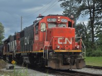 With a single tank car, CN's Seymour Branchline switch job waits as its crew contemplates their next move. The Seymour Industrial Branch serves three chemical plants on Vancouver's North Shore, and generates a fair amount of traffic going east via the Yale Sub, and south via BNSF's New Westminster Sub, and keeps this crew busy sorting incoming and outgoing cars for hours every evening.