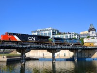 <b>Something old, something new, something borrowed, something blue.</b> So goes the old rhyme that lists what a bride must wear.... The power on CN 149 has three of those attributes with lead unit CN 3040 only being a few months old, while trailing unit IC 2455 (still wearing Conrail blue) was built 22 years ago as LMSX 728. 