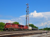 <b>Ethanol loads past Lasalle Yard.</b> CP 650 with ethanol loads for Albany, NY passes the mostly empty Lasalle Yard with ES44AC's CP 8868 & CP 9373 for power.