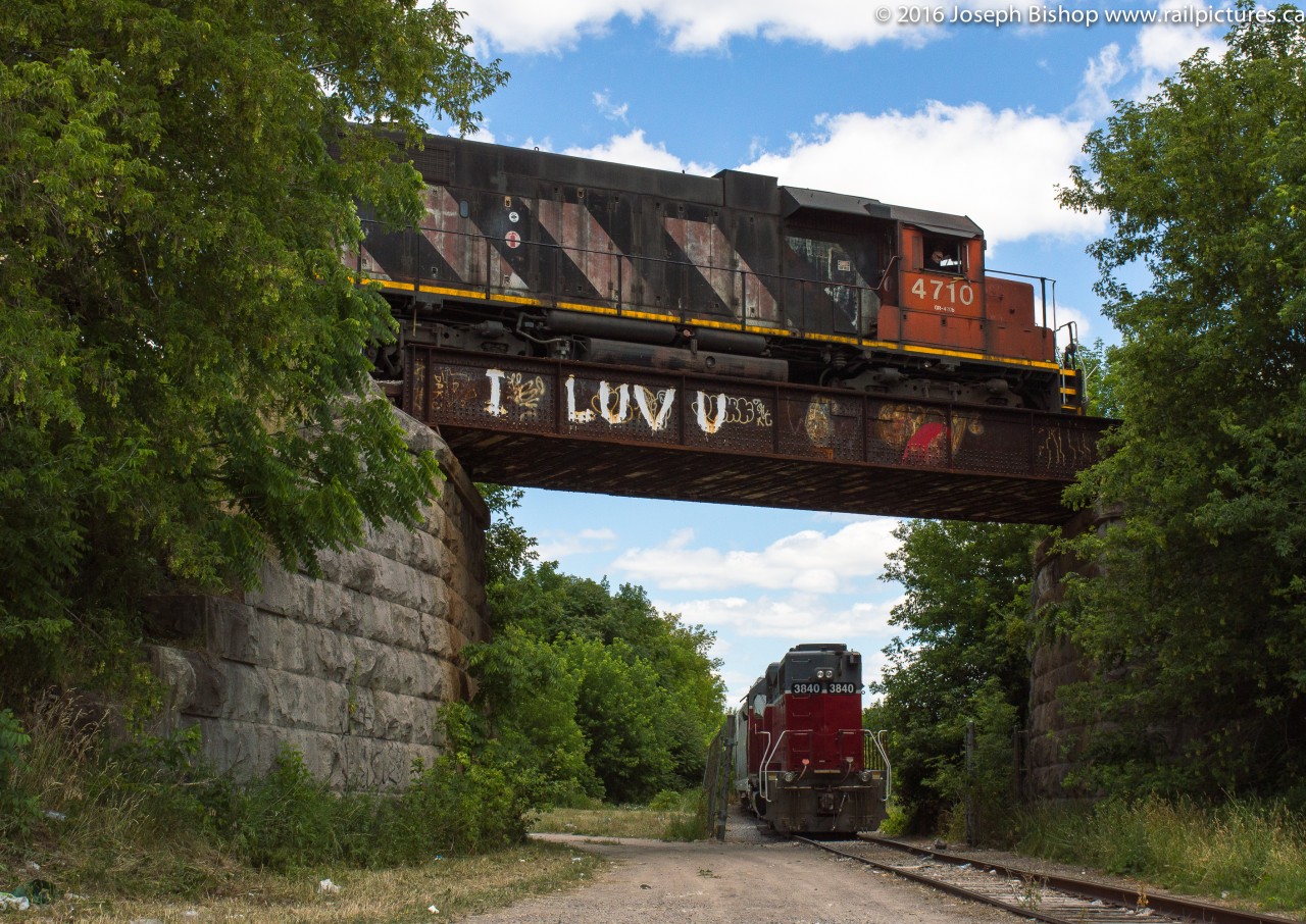The ever elusive Over/Under shot of the CN Hagersville Subdivision and the Burford Spur.  Today the stars aligned for me as I pulled up at the yard in Brantford and saw CN 580 getting ready to depart with CN 4710 for Cainsville and no sign of SOR 496 I got myself over to the Brant Food Centre quickly.  There I found 496 parked under the Hagersville Sub with NECR 3840, a few minutes later the throttle up of a geep was heard and CN 580 rolled overhead completing the shot.