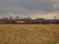 CP 420 pulls over the diamond and past the small interchange yard in Utopia with CP 8531/SOO 6027/CP 2262 and 14 brand new SHPX tanks for the BCRY going into storage on the Penetang spur, where they are still sitting now. After a quick meet with 247 at Essa and the setoff here, they'll scoot into the old Ypres siding to clear and leave their tail end setoff for Spence to pickup later, also letting 330 by currently stopped behind them at Essa after meeting 247 at Craighurst while 420 works here at Utopia! After hours of quiet, it's amazing how quickly things can start happening on the MacTier sub sometimes! 