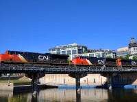<b>A trio of ET44AC's.</b> A trio of ET44AC's (CN 3029, CN 3043 & CN 3063) lead CN 149 over the Lachine canal in the Port of Montreal.