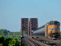 <b>UP DPU over the river.</b> UP 5360 is the rear DPU on ethanol train CP 650 which is crossing the St-Lawrence river after leaving the island of Montreal. It is destined for Albany, NY. Up front is CP 8924.