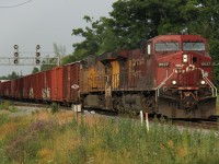 CP 8527 and UP 5360 lead an eastbound manifest at around 7:45 on the morning of July 13, 2016. 