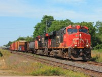 A late morning eastbound mixed freight passes through Ingersoll.