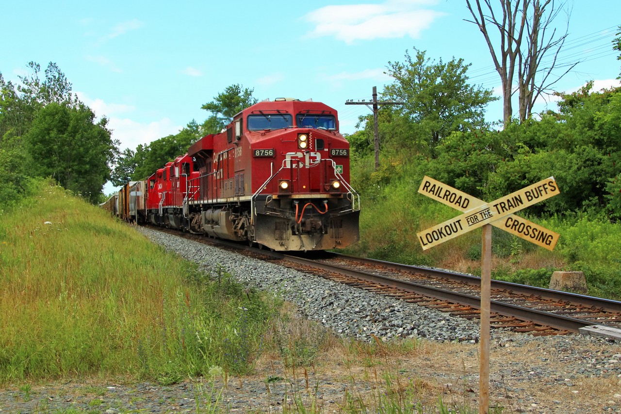 This area of the Galt sub at MM43.2 has been a favourite area of rail fans for a lot of years and I've met so many great people there. I found this sign at a garage sale and thought it only fitting that it would make an appearance at one of my favourite locations. The power for todays picture is CP 8756 with CP 3097 and CP 3042 cleared to Guelph Junction.
