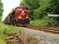 Having just climbed their way up and out of the Hamilton basin, CP 247 approaches Concession 6 and MM 67.83, led by CP 8846 with CP 9812 exit Waterdown with 7900 feet of train in tow.