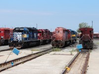 St.Lawrence & Hudson SD40-2 has just been brought to the east end of the shop ready to enter on track 3. It has been sold and will have it's safe to travel inspection performed.