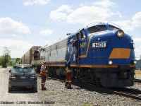 From a day that included railfanning with the great Arnold Mooney, to malfunctioning level crossing gates and signals on Ingersoll Avenue, OSR 1401 and 1620 had already arrived and been in Woodstock for about an hour, with it's cut of cars bound for Coakley. Here, the crew hand the orders up to the engineer.