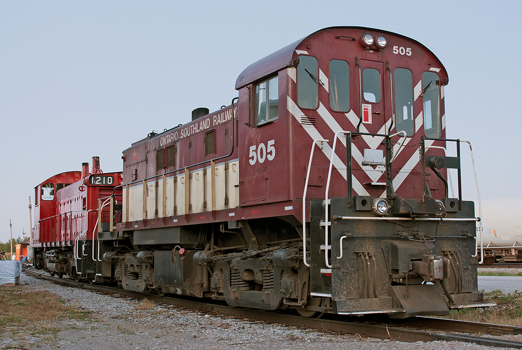 A rocket and a pup This coupled up duo rests on the water track after a day of switching industries in downtown Guelph. For switching purposes, I prefer the RS23's very responsive throttle and fast loading over the SW1200RSu even though I'm a GMD guy.