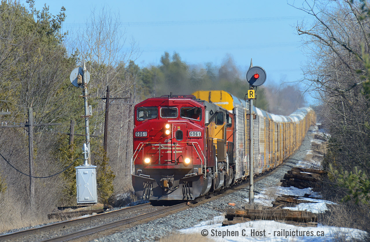 SOO 6061, the last SD60M in SOO paint splits the classic 1945 spired searchlights  at mile 47.9 Galt sub.