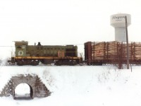 Gloomy and dull winter day as Ontario Paper #4 pushes a few carloads of logs back into the Thorold Pulp & Paper facility in Thorold South.  The plant today is called Resolute Forest Products.