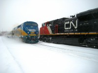 CN 8837 (brand new at the time) and CN 5682 lead CN 321 through St-Henri on New Year's Eve in 2007.