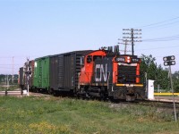 I think that this "City Switcher" job was not long for this world at this time. I don't remember hearing it on my radio again. Presumably, it worked the downtown yard, and the occasional business on the tracks from that yard to the mainline. That downtown yard had pretty much been de-commissioned at this time, and would soon be redeveloped.
The SW1200RS's worked that yard, and once it was gone, so were the SW's (for the most part). GMD-1's in all their wheel configurations would dominate the transfer and industrial siding jobs soon.
The track that can be seen at left is the east leg of the wye at Bretville Junction, where the Camrose Sub, from the south, joins the mainline (Wainwright Sub).
