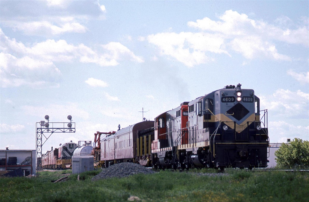 Generally, this is something that you do not want to see when out train watching. This wreck train is headed east on the Wainwright Sub (I don't recall if it continued east or went south on the Camrose Sub).
The consolation was they had an ex-NAR unit on the lead - the second time that I would see such an arrangement.