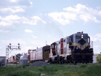 Generally, this is something that you do not want to see when out train watching. This wreck train is headed east on the Wainwright Sub (I don't recall if it continued east or went south on the Camrose Sub).
The consolation was they had an ex-NAR unit on the lead - the second time that I would see such an arrangement.