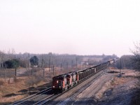 Just because I was able to listen in on the RR conversations, doesn't mean that I would know that train this was. If the crew was broadcast signal indications, they would simply identify themselves as "Extra 5305 West".
This looks like they took all the left over cars in the yard that needed to go west and they put them on this train.
We drove out to Carvel for the first time. It was about an hour's drive from our home. What attracted me to the area were two rather large curves in the Edson Sub mainline (behind me in this scene) that I had seen on a map. There would be several more trips to this location in the future.