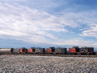 This is my wife's shot taken just north of Morinville. Soon after this picture was taken, this line would be abandoned north of Legal. Just to the east of Athabasca, a large oriented strand board plant was built, and rather than upgrading this line, it was mostly abandoned and a new line was built off the Lac La Biche Sub at Boyle - the Alpac Spur. It is 22.4 miles of new track.