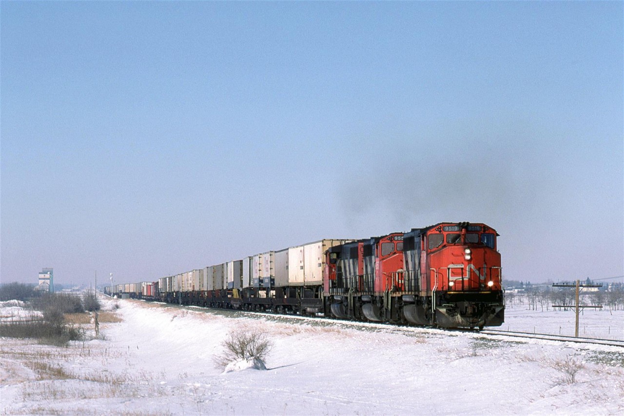 214 leaves the siding at Bruce and continues east on a cold, but sunny February day.