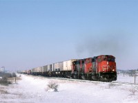 214 leaves the siding at Bruce and continues east on a cold, but sunny February day.