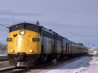 The westbound "Super Continental" is about a mile from the downtown VIA station. It is still on the Wainwright Sub, however, as it has veered SW from the mainline at East Junction. Had it gone straight, it would have gone onto the Calder Yard entry on the north side of town, and bypassed the downtown altogether.
Northlands Coliseum may be seen at the right edge of the photo. 
This would be my last photo of an old F unit leading a VIA train.