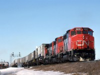 Train 214 is leaving the Calder Yard bypass track, and entering CTC track that will become the Wainwright Sub in about another 300 meters. This train was pretty dependable, and was easily identified by its TOFC traffic.
My means of transportation is seen at lower left.