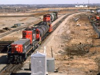 This transfer job is likely only going a short distance down the Camrose Sub, and will clear up in a siding  so that #820 can continue southward. It sure looks like a light day for #820. They won't be bring much back either given that they only have one 2000 horsepower unit.