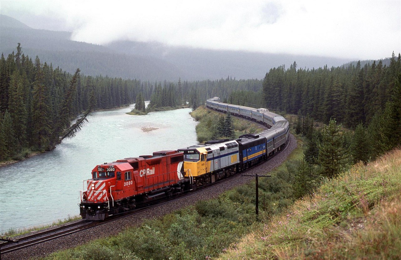 We would see a similar configuration of power on the westbound "Canadian" later in the day. We had not seen it on the day before, nor would we see it the next day. On this day, the two "Canadians" would have a CP unit assisting. The trains were more or less on schedule, therefore, it would be safe to assume that this was planned.
Anyhow, this is the classic view of Morant's Curve, and unlike the postcard view, we got the much more common weathered in view.