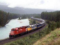 We would see a similar configuration of power on the westbound "Canadian" later in the day. We had not seen it on the day before, nor would we see it the next day. On this day, the two "Canadians" would have a CP unit assisting. The trains were more or less on schedule, therefore, it would be safe to assume that this was planned.
Anyhow, this is the classic view of Morant's Curve, and unlike the postcard view, we got the much more common weathered in view.