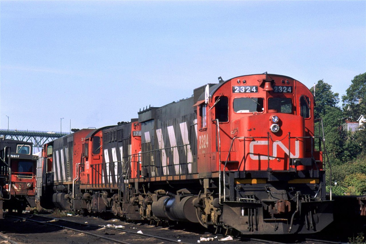 The power from a gypsum train is being put to bed on the "shop" tracks in Dartmouth yard.