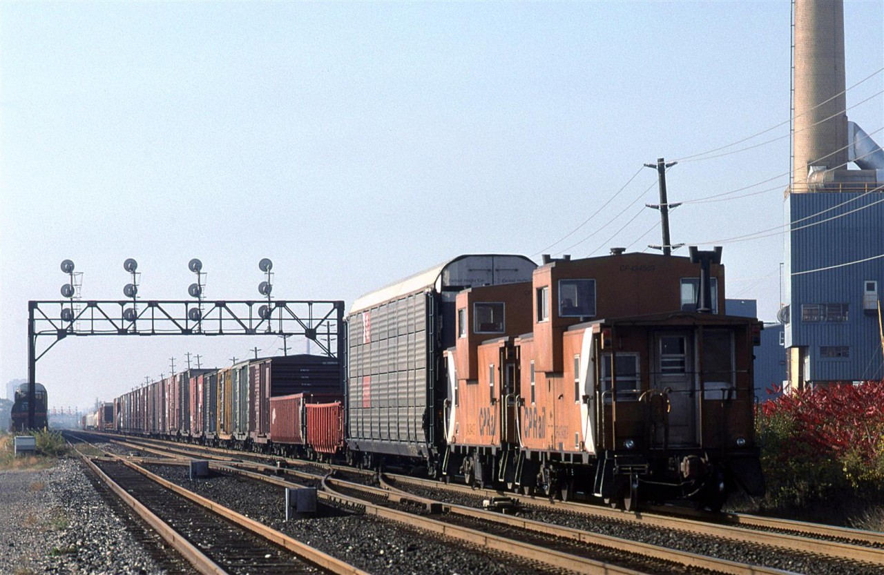 This is likely the same CP train that I saw the previous day - a trackage rights situation to allow access to the Oakville Yard and Ford plant seen in the background.
