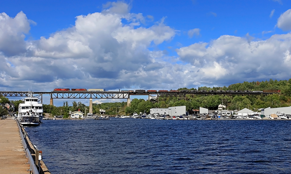 After a pretty quiet afternoon on the CP Parry Sound Subdivision a short CP train (the last car is just coming into view in this shot) rumbles into view crossing the Seguin River Trestle as the clouds begin to retreat inland.
