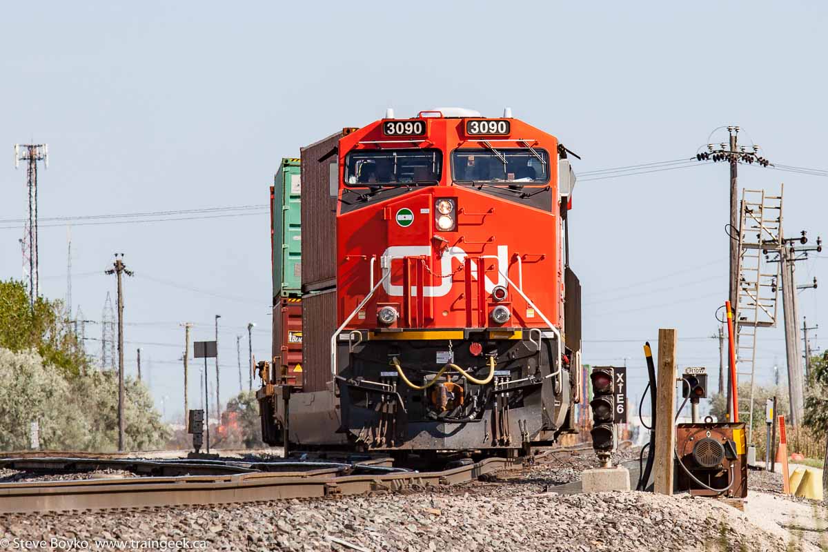 CN 3090 and train came off the Sprague subdivision, and were driving around the Symington Yard in Winnipeg on "X" track.