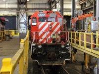 Looking rather sad with it's patched up front window,door window and number board 5697 waits to be pulled out of the shop after having air brake repairs made to allow it to travel one final time on CP trackage.