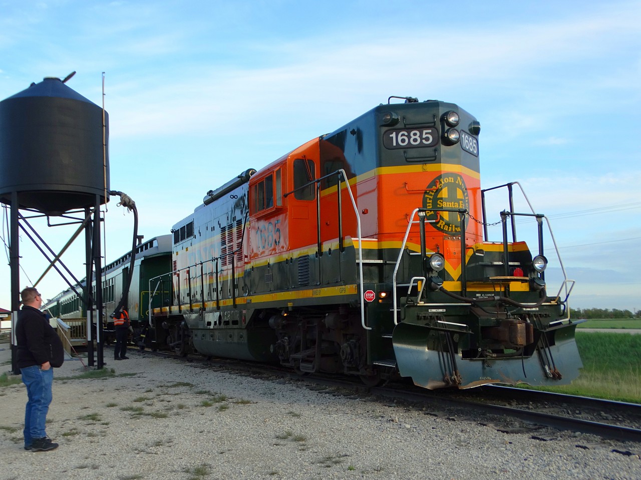 Ex-BNSF 1685 has just coupled up to the historic 100+ year old Prairie Dog Central passenger cars, and is getting ready to file them away into the shed. This unit was built in 1957 for Manitoba Great Northern Railway, but was painted in Midland Railway of Manitoba colours as locomotive number 2. In 1971, it became Burlington Northern Manitoba 2, then in 1999 it became BNSF Manitoba 1685. It was retired in 2007 and donated to the PDC in 2010.