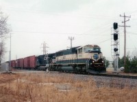 The NS autoparts train #328 once again outdid itself with its' remarkable variety of power. Seen on this morning roaring thru the Nelles Rd crossing at Grimsby is a seldom-seen (in Ontario) BNSF paint scheme from the early '90s.   I've always considered demise of this train the single biggest loss in my railfanning history around these parts. The train could feature anything up front.......whatever was available. Todays head end features BNSF 9471 and NS 9476. This is as close as I got catching two roads with the same unit numbers.......