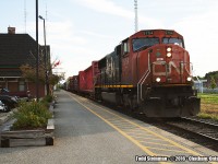 The rail scene in Chatham has been through numerous changes within the last 10 years of my last visit. Although it's station on the CN is still well preserved, it was one of the first stations to lose it's agent. Now a machine will print off your tickets, as the building is only open during train time. Also, the yard has disappeared, leaving only a single track through town. So it was a big surprise to me to find a CN freight led by lone unit 5754, rumbling through Chatham all the while thinking that freights no longer trundled along the Chatham Subdivision. 