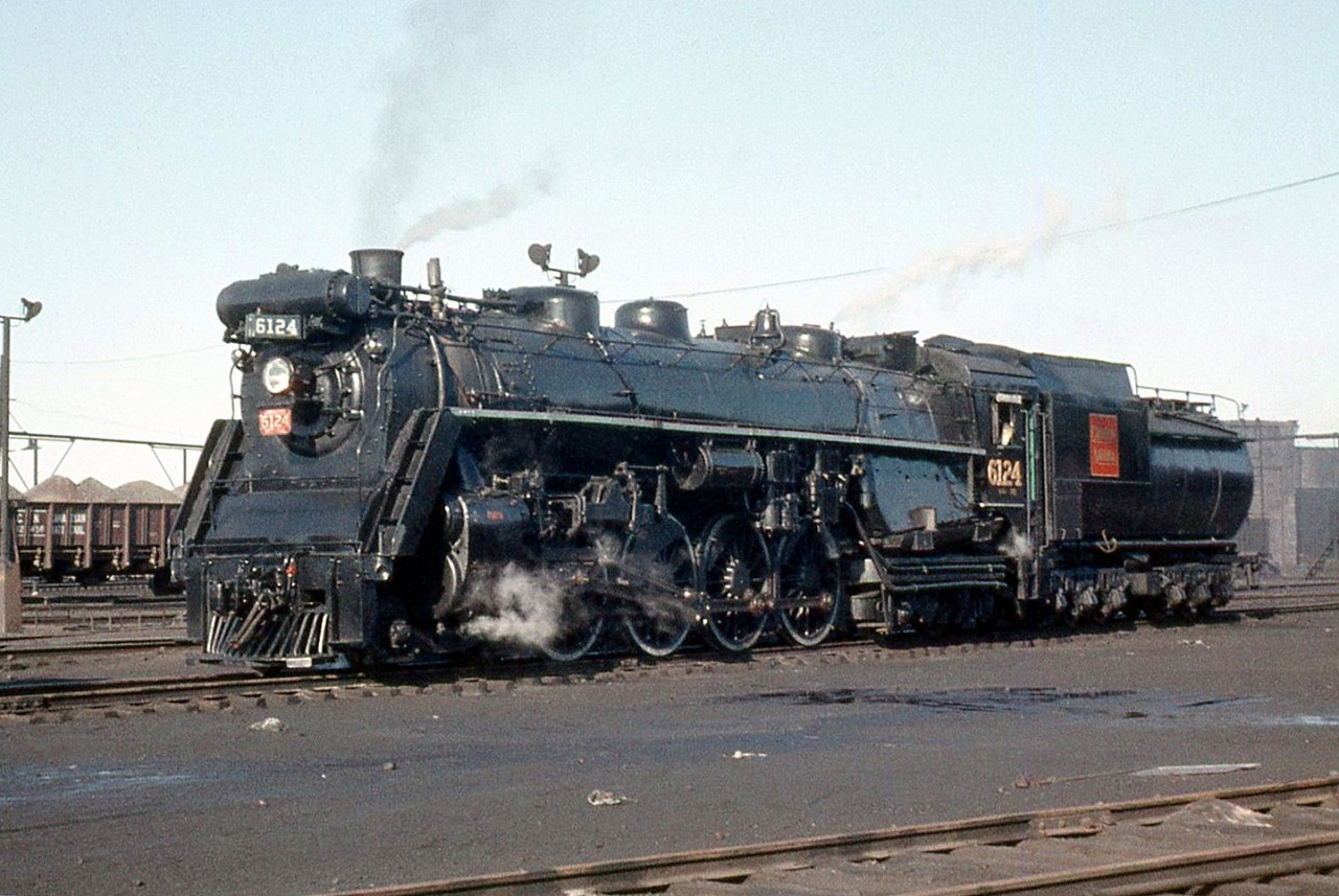 Canadian National Railways 4-8-4 Northern 6124 is pictured at CN's Mimico Yard servicing facilities in 1958. Part of U2b class 6120-6139 built in 1927 by MLW, 6124 was scrapped after the end of the steam era in November 1961.