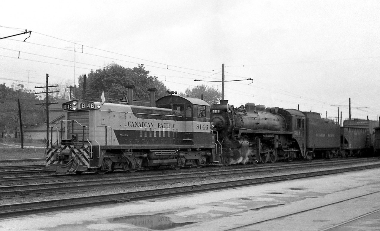 Steam was rapidly nearing its end in October 1959 when CP P1b-class Mikado 5118 (built by CPR's Angus Shops in 1912) passed through Galt with diesel "push engine" assist SW1200RS 8146, built by GMD London and less than a year old at the time.