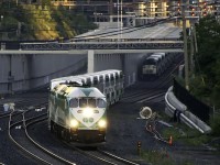 2 MP's come up the Newmarket Sub under the Strachan Ave....I'm not sure what to call it. It seems an extensive and long grade separation. Meanwhile, GO 559 heads back up the Georgetown line with a shorter train about to knock down the next signal. Last time I was at Bathurst St, it looked like this!! http://www.railpictures.ca/?attachment_id=21616