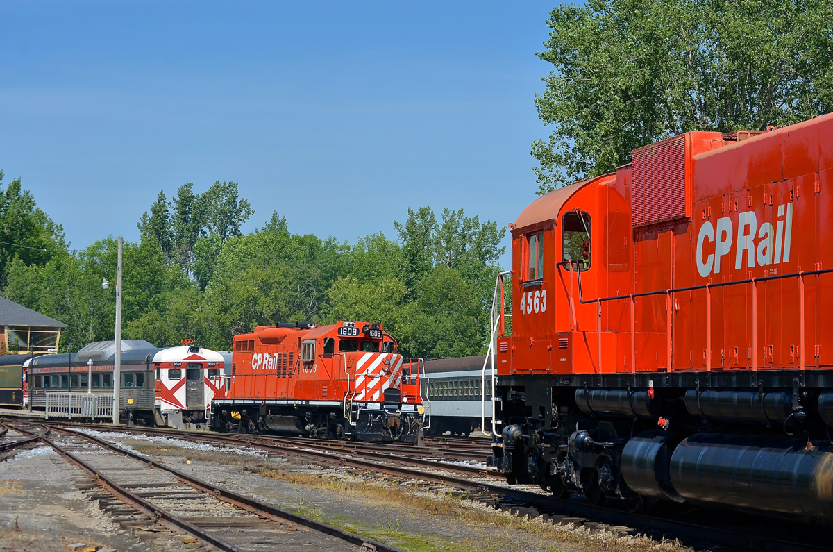 CP Rail staredown. GP9 CP 1608 and M630 CP 4563 are facing each other at Exporail on a sunny morning. Behind CP 1608 is RDC-1 CP 9069.