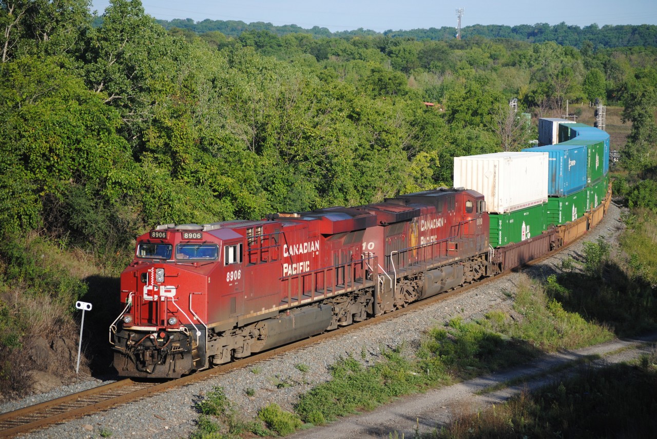 CP 143 glides down the hill with lots of intermodal.