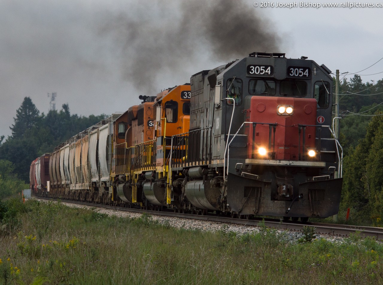 GEXR 3054 leads train 432 out of Guelph.  The sun didn't want to cooperate but the crew really poured on the smoke as they passed.  Thanks to Rob Smith for the inspiration for the photo location.