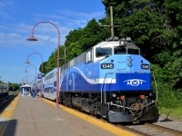 <b>Repainted F59PH.</b> Repainted and refurbished AMT 1346 leads AMT 176 from Saint-Jérôme into Montreal West station.