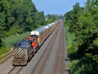 <b>A BCOL leader after a 2 hour wait.</b> I waited nearly 2 hours to shoot CN 401 with BCOL 4654 as the leader and CN 8902 trailing, seen here approaching Taschereau Yard in Lachine. It arrived here much later than I expected as it set off CN 4793 and 15 cars at Southwark Yard, a rarity for this train which is a straight shot from Joffre Yard to Taschereau Yard most of the time.