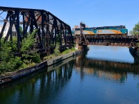 <b>A pair of F40's.</b> VIA 6406 & VIA 6456 lead a 3-car VIA 635 over the Lachine Canal on a sunny afternoon in Montreal.